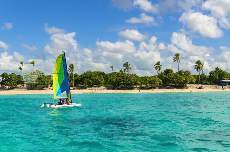 Colorful,Catamaran,On,Azure,Water,Against,Blue,Sky,And,Exotic